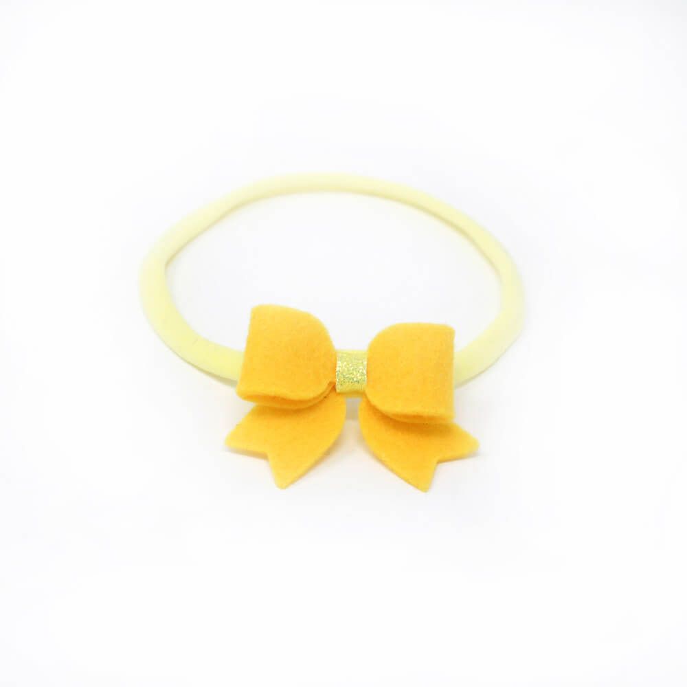 Small Dainty Yellow Bow